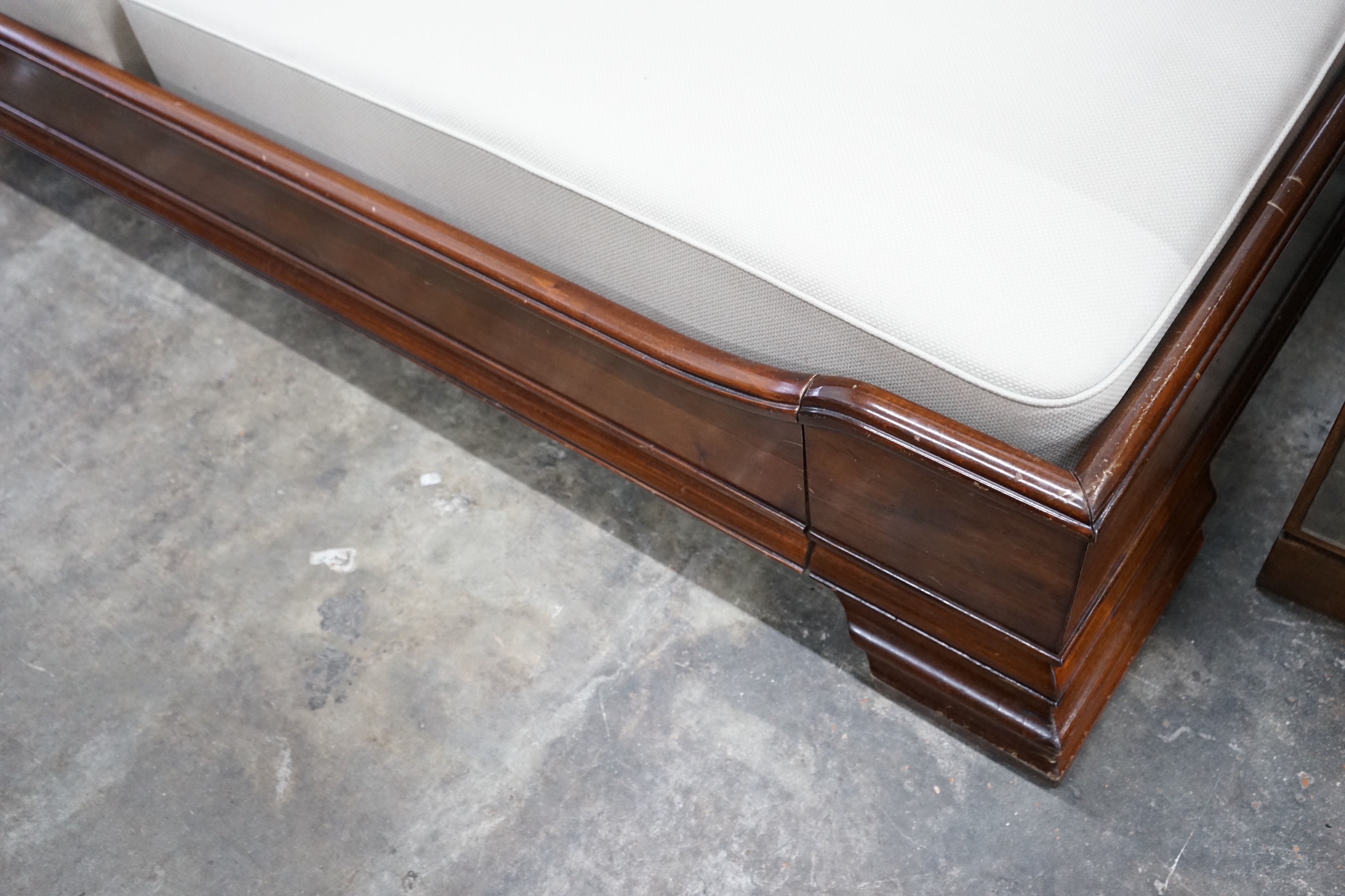 An 'And So To Bed' mahogany kingsize sleigh bed with Prestige two section divan base, width 161cms, length 224cms, height 100cms